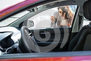 Woman Forgot Her Key Inside Car photo
