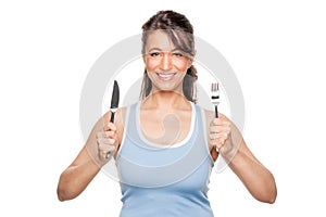 Woman with fork and knife