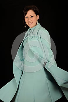 Woman in formal aqua dress