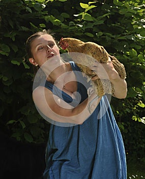 Woman with fowl