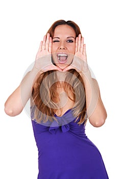 Woman framing her face with her hands. She is winking