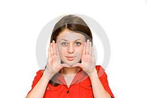 Woman framing her face with her palms