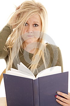 Woman frazzled with book