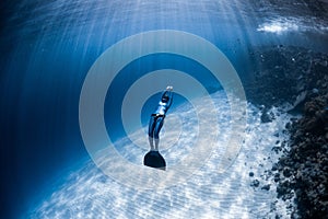 Woman freediver in monofin