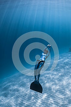 Woman freediver relaxes