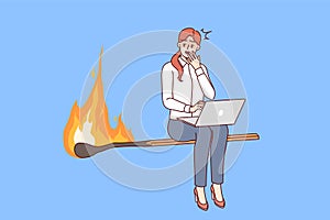 Woman freelancer is afraid of danger of violating business deadlines, sitting on burning match