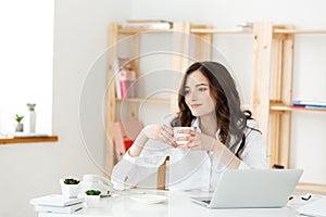 Woman Freelancer or business woman used Labtop working at modern office. Business and Technology concept