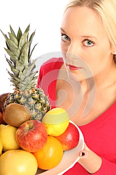 Woman with fresh fruits