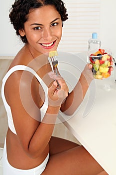 Woman with fresh fruits