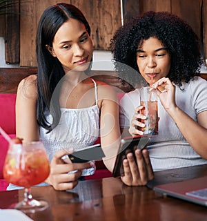 Woman, friends and phone with credit card drinking at restaurant, bar or cafe making online payment or transaction