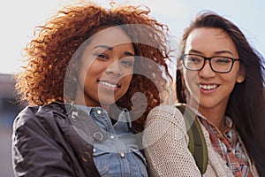 Woman, friends and university student in smile with backpack on campus for education, teaching and learning. Portrait