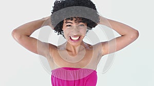 Woman with frizzy hair shouting