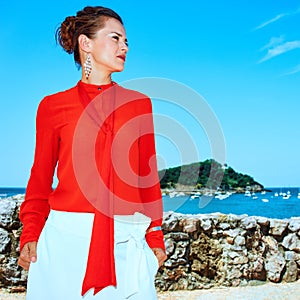 Woman in front of the lagoon in Donostia, Spain looking aside