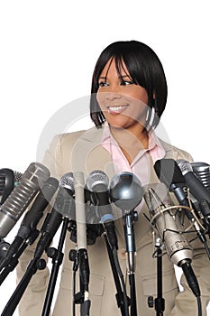Woman In front of Microphones