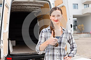 Woman in front of moving truck