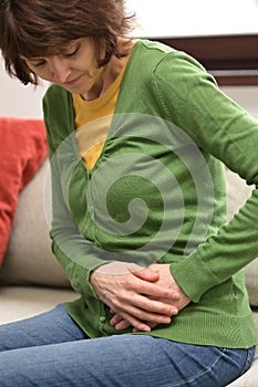 Woman Stomach Painful Sign Of Ovarian Pain photo