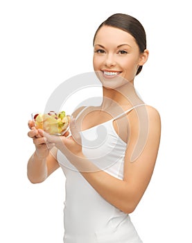 Woman with fruit coctail