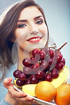 Woman fruit diet concept portrait with tropic frui