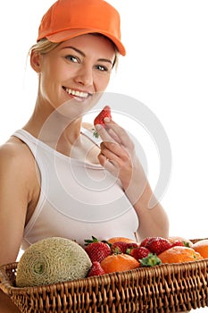 Woman with basket of fruits