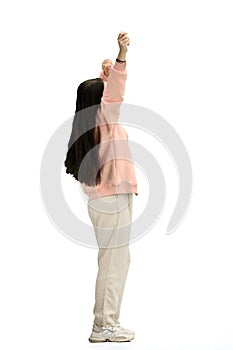 A woman, full-length, on a white background, waving her arms