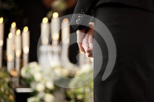 Woman at funeral mourning photo