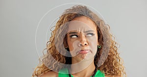 Woman, funny face and studio with goofy comedy on grey background or humor mockup space, silly or joking. Female person
