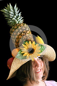 Woman with funny fruit hat