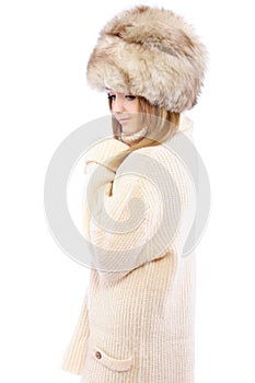 Woman in fur cap and sweater