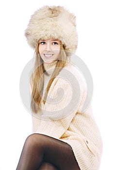 Woman in fur cap and sweater