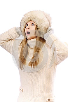 Woman in fur cap and sweater