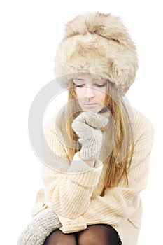 Woman in fur cap and sweater