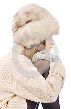 Woman in fur cap and sweater