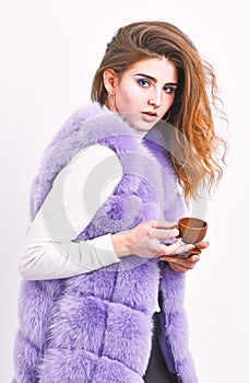 Woman fur coat drink coffee. Elite coffee concept. Elite coffee variety concept. Lady drink espresso little ceramic cup
