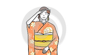 Woman in furisode looking into the distance photo