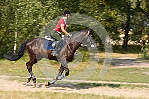 Woman on galloping horse