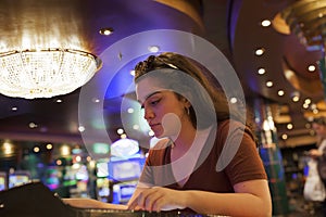 Woman gambling at the Casino