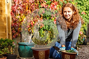 Woman gardening in the autumn