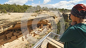 Woman Gazes at Cliff Palace