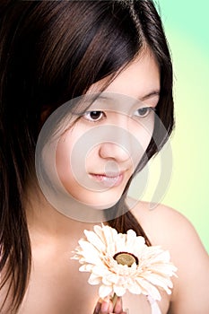 Woman with gerbera flower