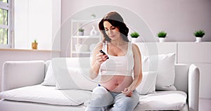 Woman With Gestational Diabetes At Home photo