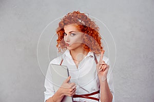 Woman gesturing a no sign. Closeup portrait unhappy, serious red head retro style girl raising wagging finger up saying oh no you