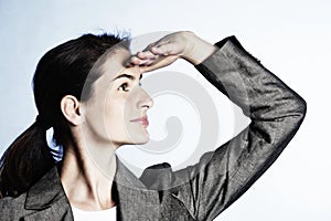 Woman gesturing positive business perspective.