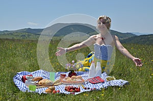 Woman Gesturing Welcome to Picnic