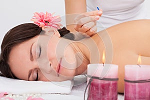 Woman getting acupuncture therapy