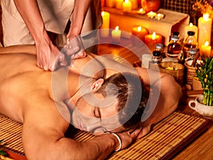 Woman getting bamboo massage