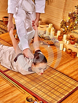 Woman getting bamboo massage