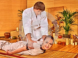 Woman getting bamboo massage