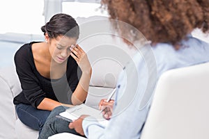 Woman getting depressed in therapy