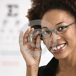 Woman getting eyeglasses photo