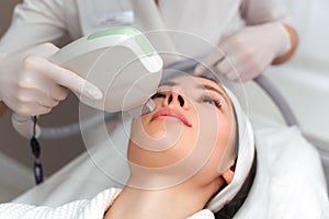 Woman Getting Facial Hydro Microdermabrasion Peeling Treatment At Cosmetic Beauty Spa Clinic. Hydra Vacuum Cleaner